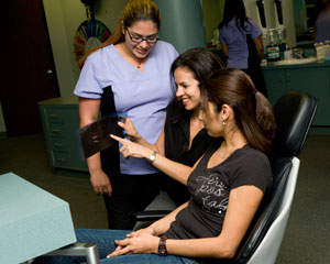 photo of doctor and staff with a patient